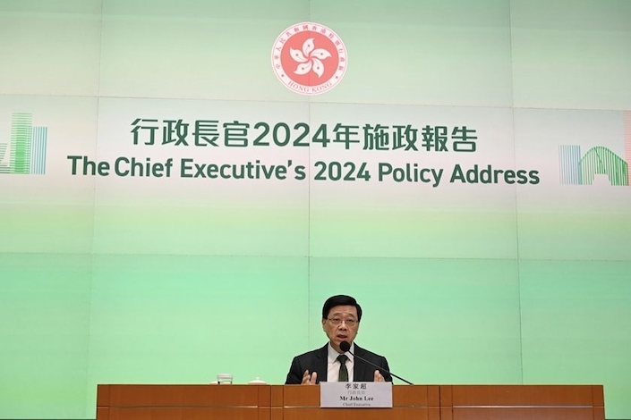 Hong Kong’s Chief Executive John Lee Ka-chiu gives his third policy address on Oct. 16, 2024.